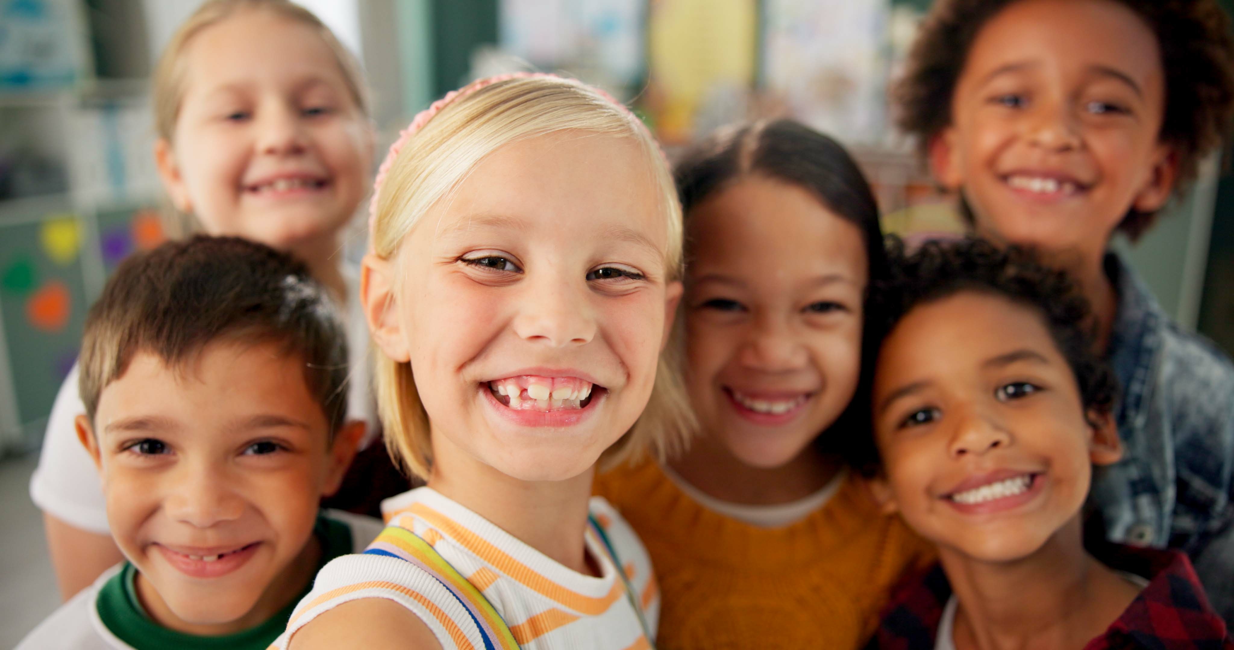 Children, school and happy in class selfie, student and fun with group for childcare development an